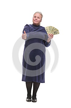 Portrait of an old woman holding money in hand and showing yes sign