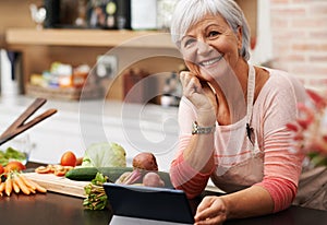 Portrait, old woman and video of cooking and tablet in kitchen and watch for learning, meal prep and guide. House