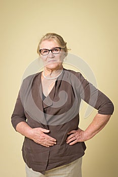 Portrait of an old woman wearing glasses