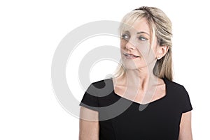 Portrait of a older isolated business woman in black looking sid