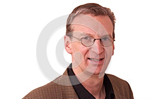 Portrait of older smiling man on white