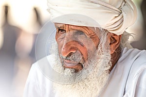 Portrait of an Omani man in a traditional Omani dress. Nizwa, Oman - 15/OCT/2016