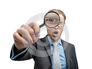 Portrait one man businessman with magnifying glass