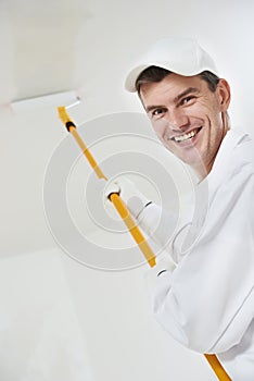 Happy house painter worker photo