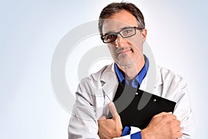 Portrait of an ophthalmologist with glasses and folder in hand