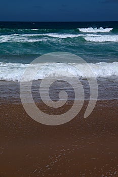 Portrait orientation view of beach in Namibe desert