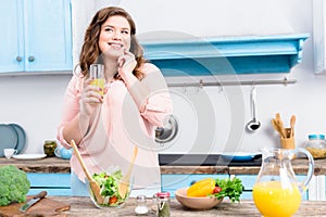 portrait of overweight smiling woman