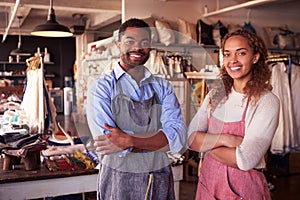 Portrait Of Owners Standing In Gift Store