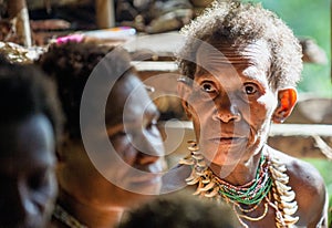 Portrait of a papuan woman from a korowai tribe.