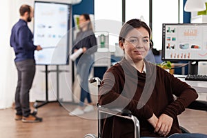 Portrait of paralyzed businesswoman working in startup business company