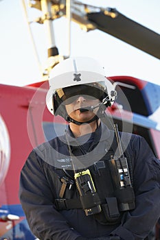 Portrait of paramedic standing in front of Medevac photo