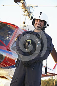 Portrait of paramedic standing in front of Medevac photo