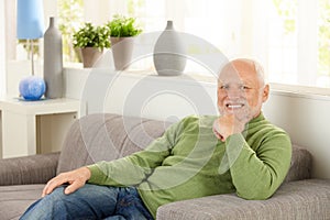 Portrait of pensioner on couch