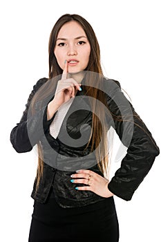 Portrait of a pensive asian woman in isolation over white background