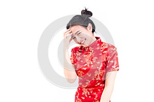 Portrait of a pensive asian woman wearing chinese dress cheongsa