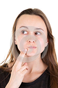 Portrait of a pensive brunette woman looking side