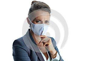 Portrait of pensive business woman in grey suit on white