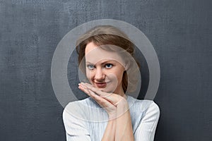 Portrait of pensive and calm young woman