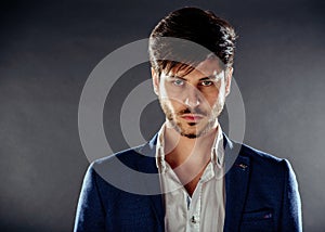 Portrait of pensive handsome man front of him