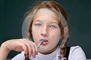 Portrait of pensive schoolgirl.Back to school, education concept