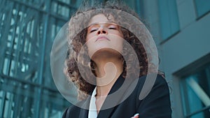 Portrait pensive serious Caucasian business woman thinking in city outdoors thoughtful young 20s girl businesswoman