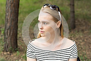 Portrait of a pensive young woman looking away