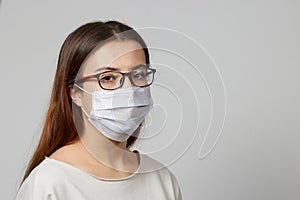 Portrait of people in a medical mask a Girl with a medical mask a boy in a mask, to protect against the spread of the virus