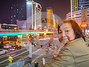 Portrait Photo of Asian senior women in the evening time at Changsha city hunan China.