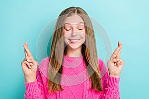 Portrait photo of cheerful funky girl closed eyes crossed fingers toothy bite lips want new present birthday  on
