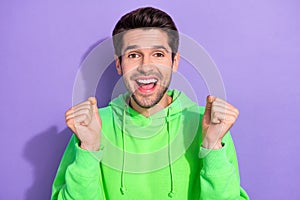 Portrait photo of hipster guy wear green stylish sweatshirt hands up unexpected winner lottery he millionnaire isolated