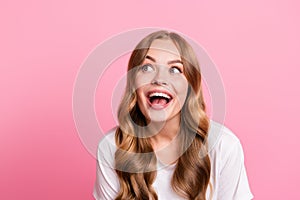 Portrait photo of young adorable stunning girlfriend surprised open mouth looking novelty promo store isolated on pink