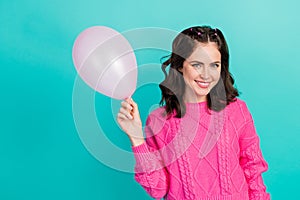 Portrait photo of young attractive cute gorgeous lady hold hand air balloon celebrating bithday gift isolated on