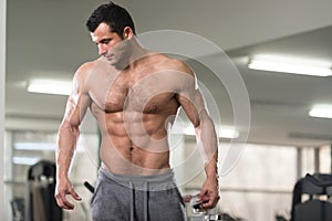 Portrait Of A Physically Fit Muscular Hairy Man photo