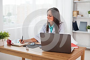 Portrait of physician doctor working in medical