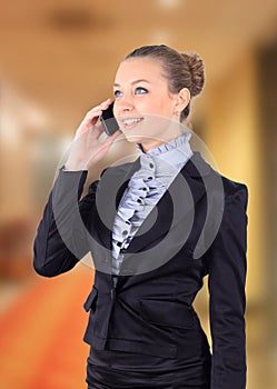 Portrait picture of a business woman talking on the phone