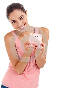 Portrait, piggy bank and happy woman in studio for budget, finance or investment. Face, smile and person with money box photo