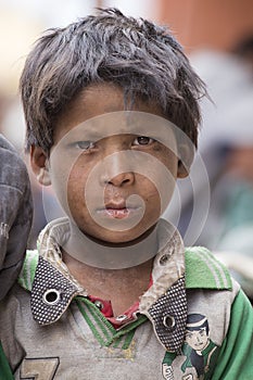 Portrait poor boy on the street in Leh, Ladakh. India