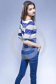 Portrait of Posing Sensual Brunette Girl with Long Hair.