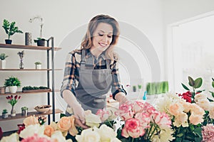 Portrait positive cheerful satisfied excited attractive self-employed lady wavy curly hairstyle touch hand plant botany