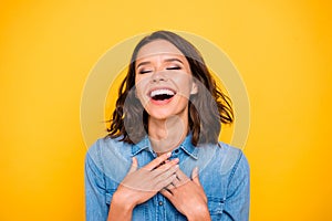 Portrait of positive cheerrful funny funky girl hear joke laugh ha-ha-ha wear youth outfit isolated over yellow color photo