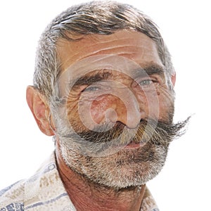 Portrait of positive elderly man with moustaches photo