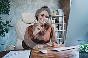 Portrait of positive gorgeous attorney lady sit leather chair arm hold eyeglasses loft interior office room inside