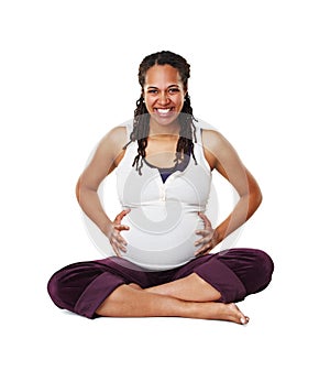 Portrait of a pregnant mother or woman in happy sitting and holding her baby bump isolated on a white background. Black