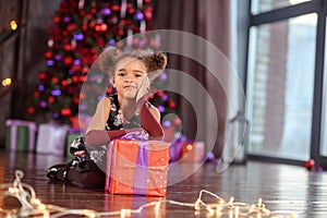 Portrait of a preschool child girl laying down. Studio shot