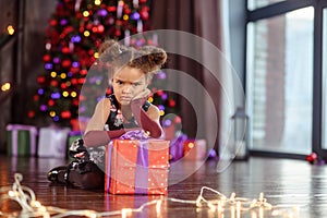 Portrait of a preschool child girl laying down. Studio shot