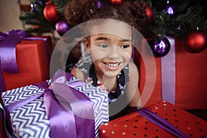 Portrait of a preschool child girl laying down. Studio shot