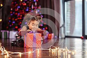 Portrait of a preschool child girl laying down. Studio shot