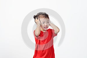 Portrait of preschooler girl having a headache