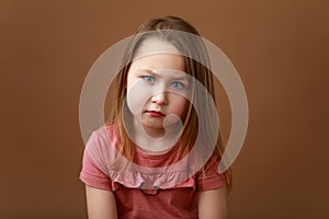 Portrait of preschooler showing emotion of anger