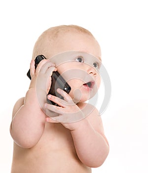 Portrait of pretty baby talking on mobile phone